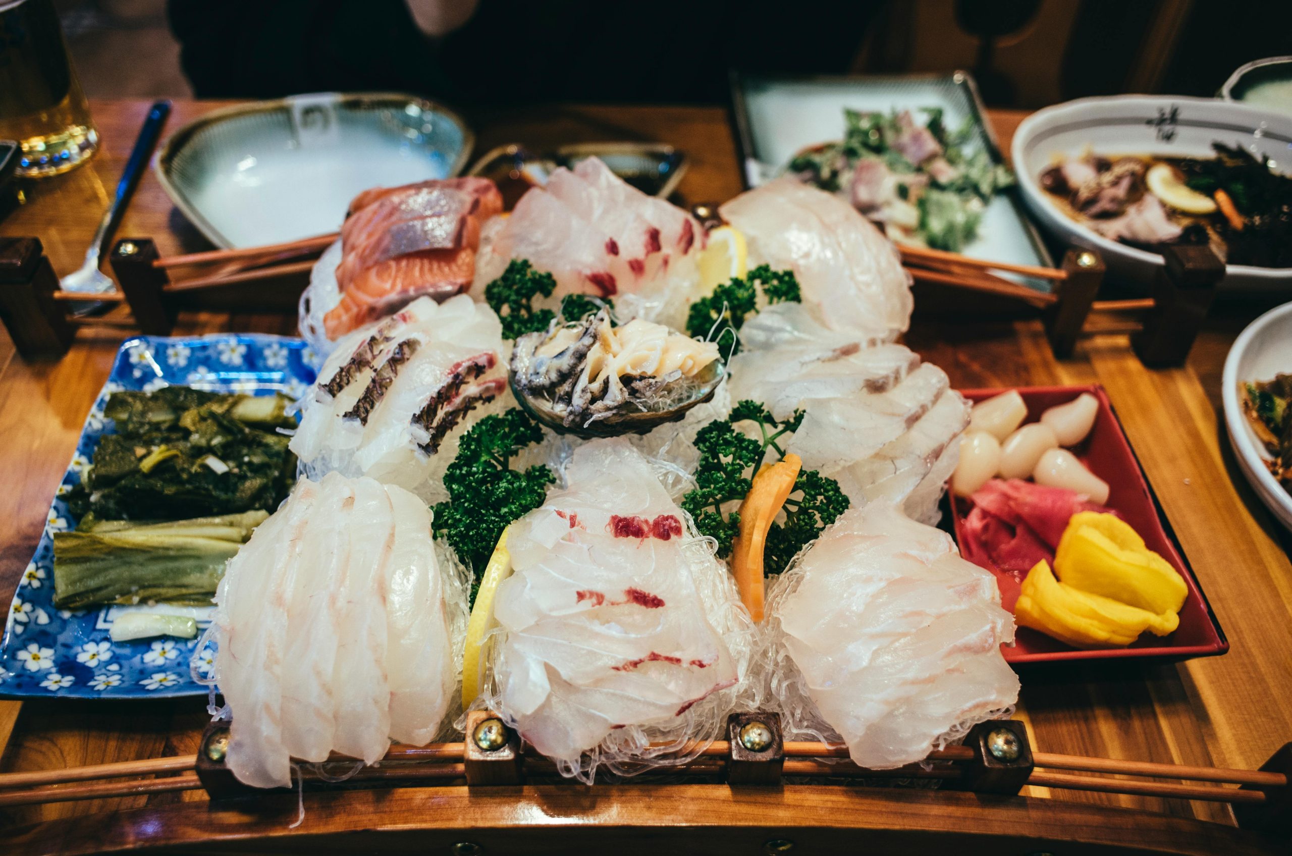 A colorful, appetizing sashimi platter showcasing a variety of fresh seafood, perfect for culinary indulgence.